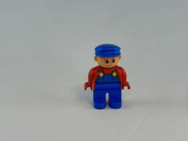 Man met blauw overal, rode trui en blauwe pet Duplo