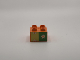 Bloemen op blok oranje Duplo
