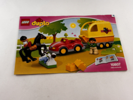 Bouwboekje 10807 paardentrailer Duplo