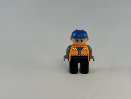 Bouwvakker met blauwe helm, zwarte broek, grijs shirt Duplo
