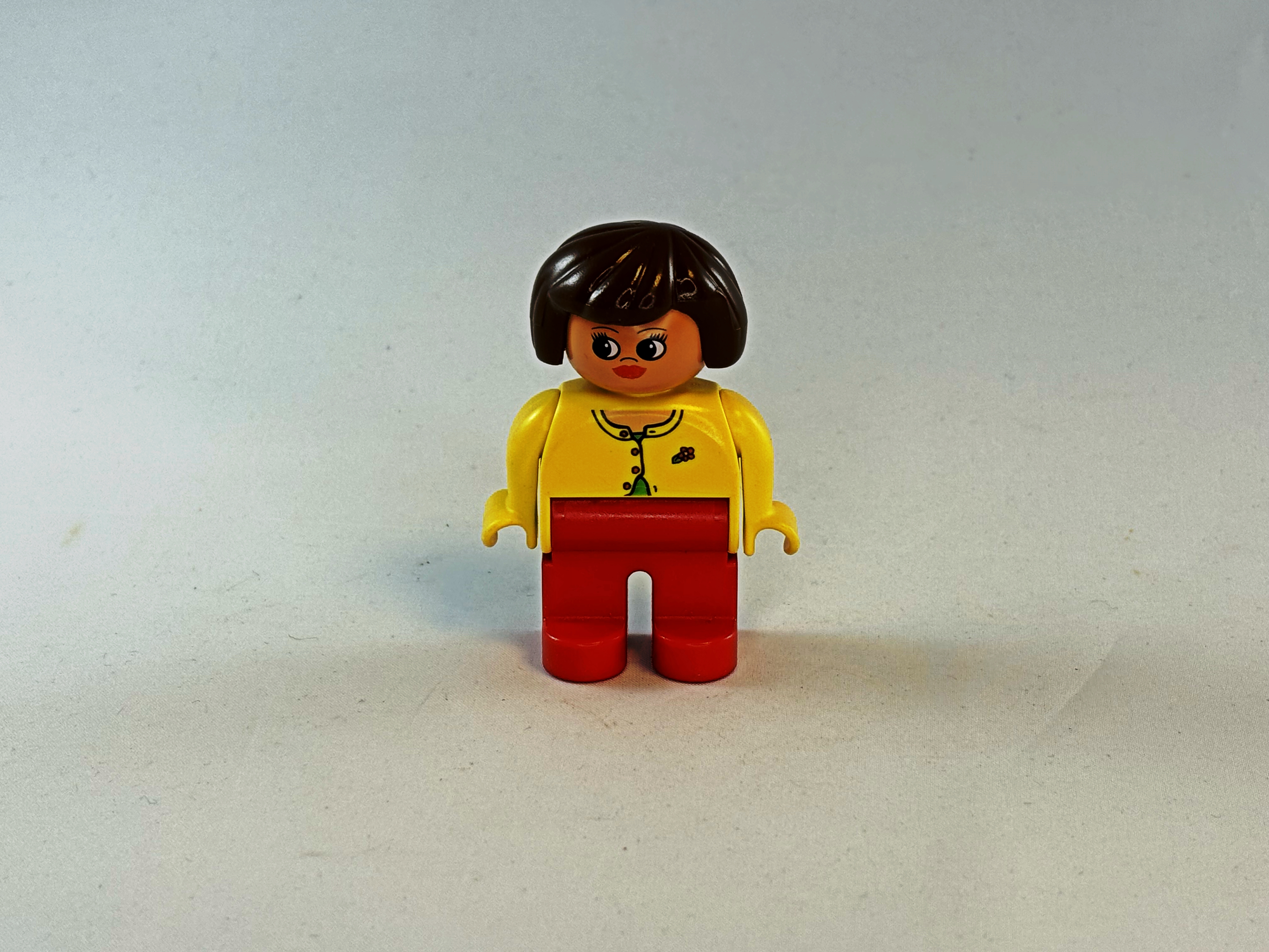 Vrouw lippenstift geel rood Duplo