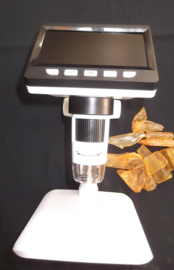 Microscoop met 10 barnstenen