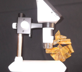 Microscoop met 10 barnstenen