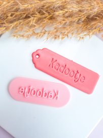 Clay stamp - kadootje