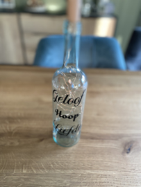 Fles met licht en tekst