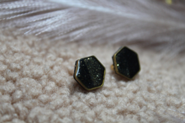 Black and gold sparkly hexagon