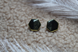 Black and gold sparkly hexagon