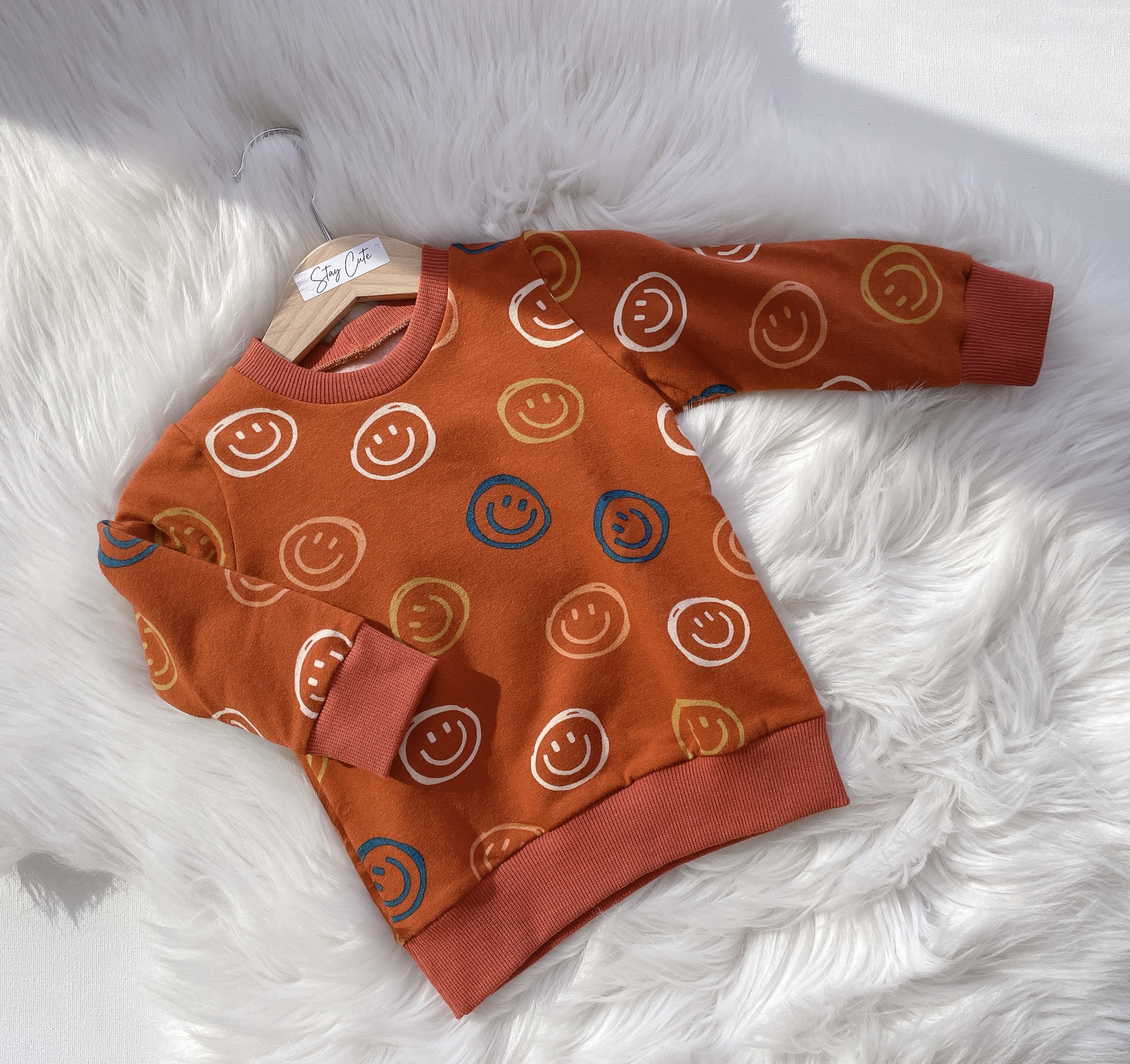 Trui smiley brique maat 80