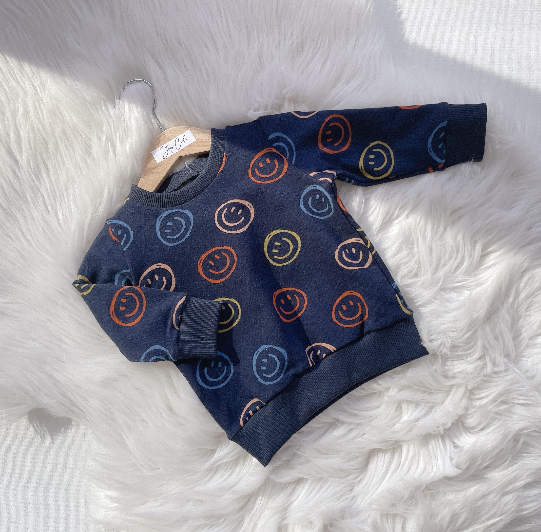 Trui smiley navy maat 74