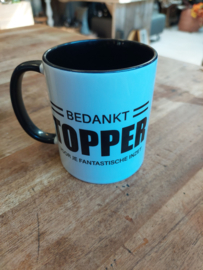 Mok bedankt topper
