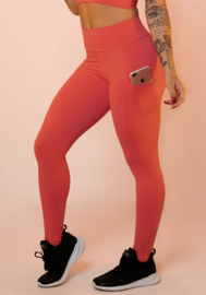 Koraal kleurige leggingbroek met basiszak
