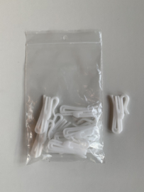 Zakje per 10 stuks witte kunststof  verstelbare inschuif gordijnhaken  (55mm )