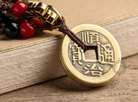Feng Shui Amulet voor bescherming - Pi Yao en Chinese Munten