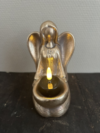 Engel zittend goud