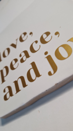 Tegel met tekst Love Peace and joy