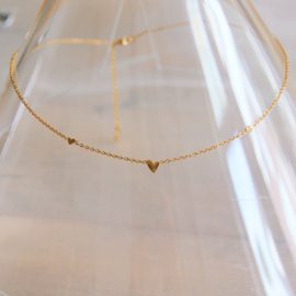 Edelstalen fijne ketting met 3 mini hartjes - goud en zilver