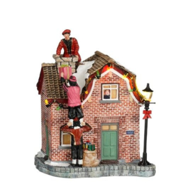 Luville Sinterklaas  Pieten beklimmen huis met ledverlichting
