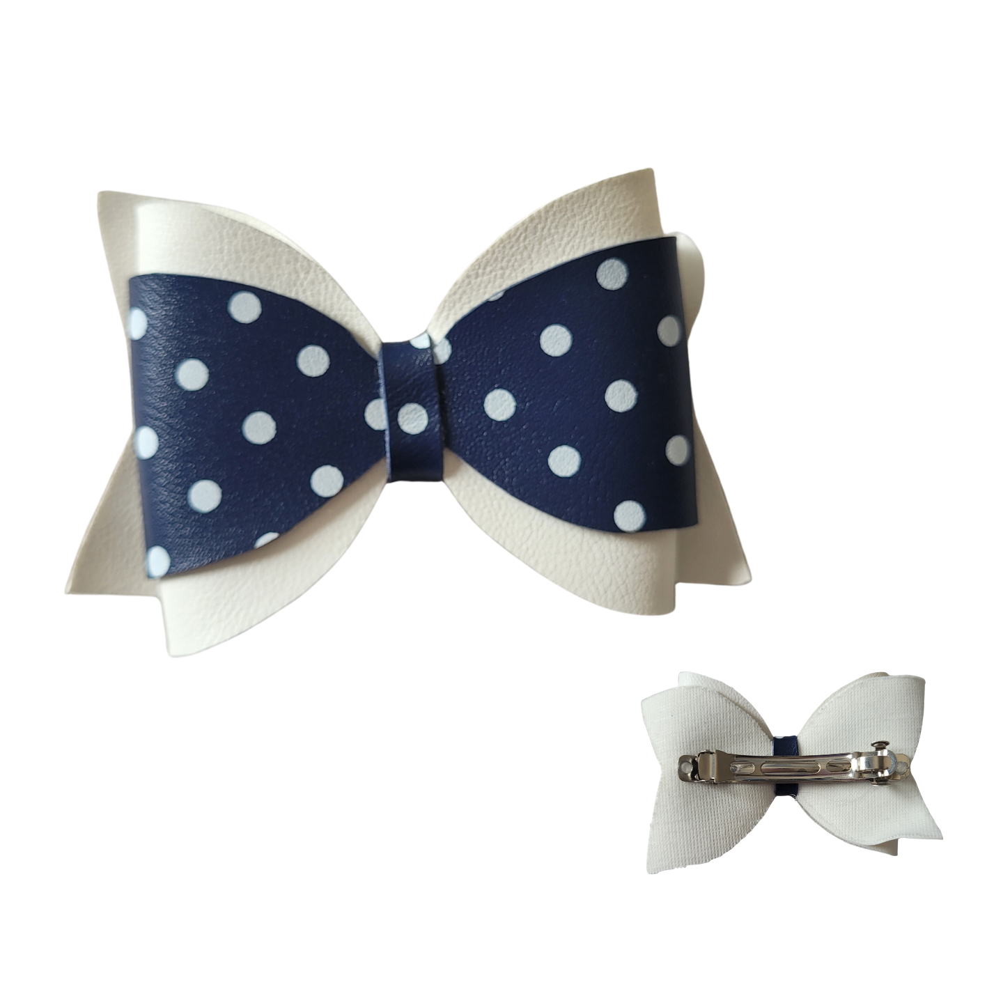 Haarklem met strik donkerblauw-wit stippels