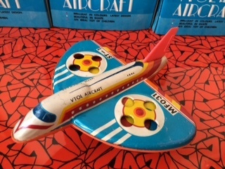 seventies tin-toy airplaine with origional packaging.