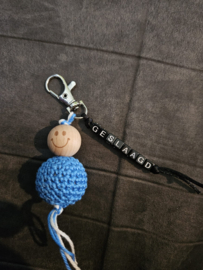 Gelukspoppetje Geslaagd met letters