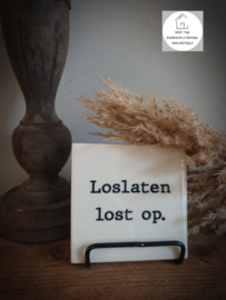 Tekst tegel "Loslaten"