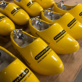 Doppenvanger klomp met logo - Geel