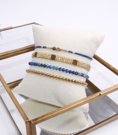 Set of four - golden and sapphire blue