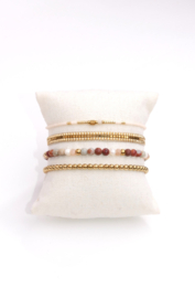 Set of four - soft terracotta gold