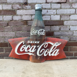 Plaster Coca Cola advertising sign