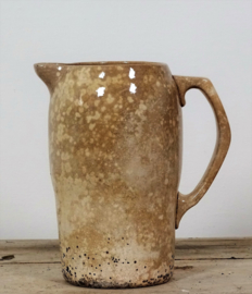 Heavily weathered pitcher