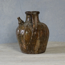 Antique walnut oil jug