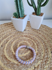 Haar elastiek armbandje blauw-roze-beige gestreept