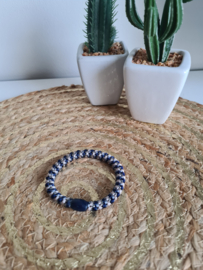 Haar elastiek armbandje blauw-beige gestreept