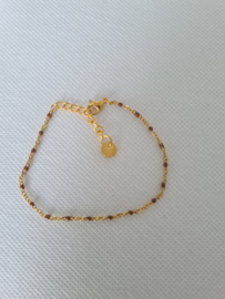 Armbandje bruin goud
