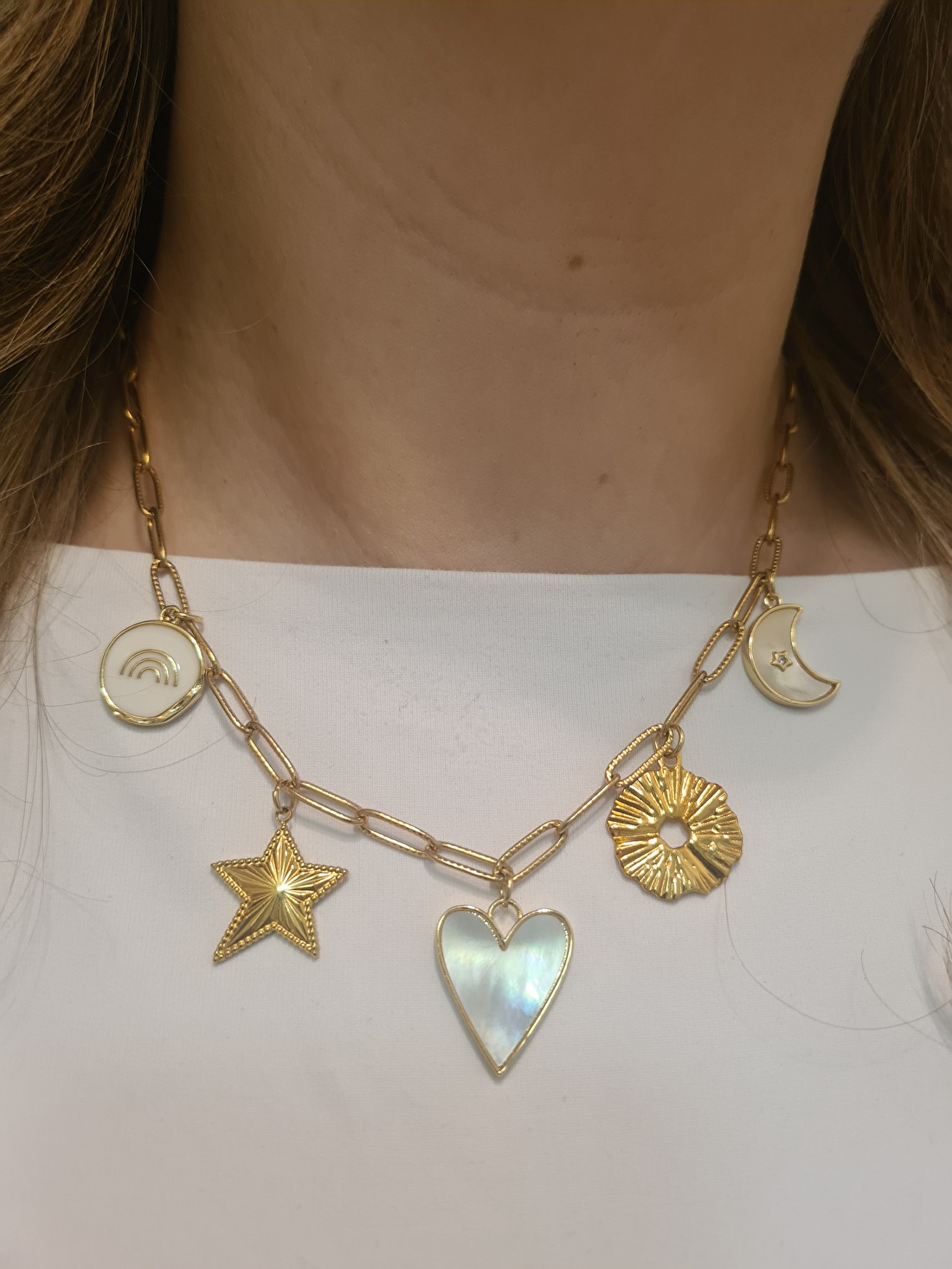Bedel ketting met verschillende bedel in goud