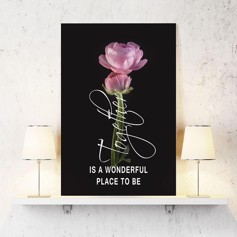 Tekst en bloemen op canvas