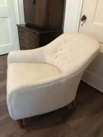 Fauteuil capiton rug