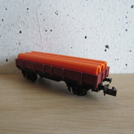 Ibertren 309 N Renfe Lageboordwagen, 2-assig, bruin, beladen met buizen in ovp