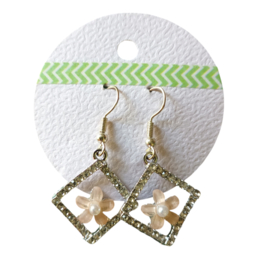 Glitter oorbellen met bloem (zilverkleurig)