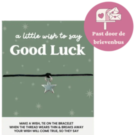 Kaartje met "Good Luck" -  sterretje aan een armbandje