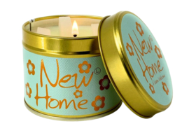 Geurkaars in blik met tekst "New home"