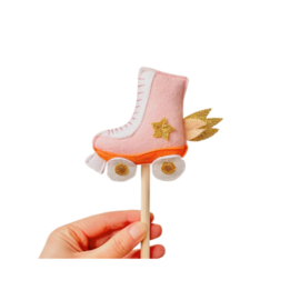 Magical rollerskate cake topper