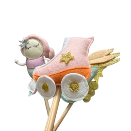 Magical rollerskate cake topper