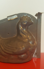 Antieke chocoladevorm in de vorm van een kip