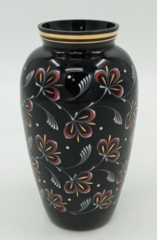 Zwarte vaas met floraal decor