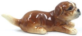 Liggende boxer puppy door Goebel