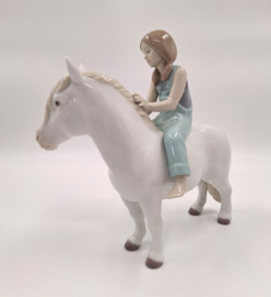 Lladro, meisje op pony #9139