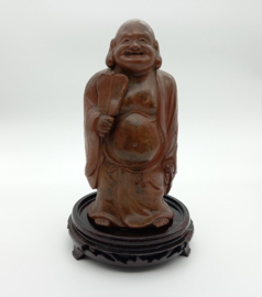 Lachende boeddha op basement