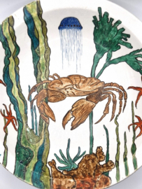Bord met kreeft in majolica stijl