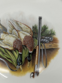 Porseleinen bord met tinnen buitenrand